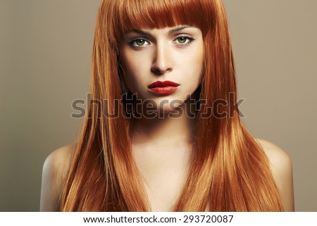Beauty Girl Portrait. Healthy Red Hair. Beautiful Young Woman