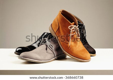 a lot of men\'s shoes.men fashion still life.boots