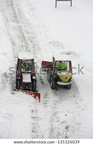 A snowplow clearing a road