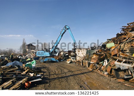 Loads of metal waste on the junkyard , to be recycled