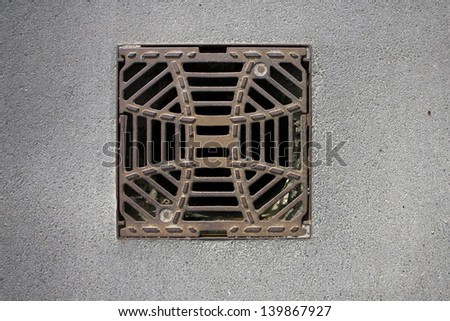 Manhole cover metal storm drain with warnings
