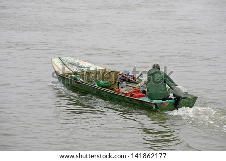 Fishing boat were running, small fisherman boat on the river