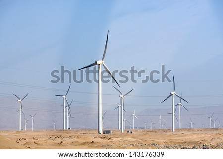Electric wind turbine generators in the desert in Egypt