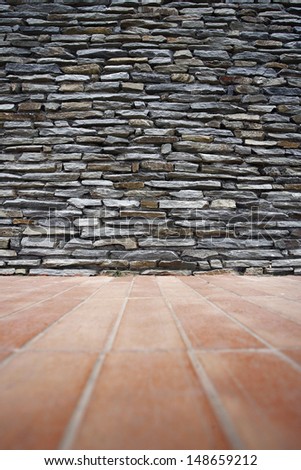 decorative slate stone wall surface with red floor