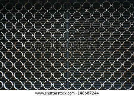 abstract decorative metal protection for windows, metal hearty living with large holes, Metal net circle texture background networks with holes