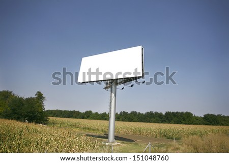 Empty billboard on background of sunset sky for your advertisement