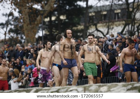 ZEMUN, SERBIA - JAN 19, 2014: Swimmers for Holy Cross before the race.The Serbian Orthodox Church, traditionally Epiphany with competitions to retrieve the Holy Cross from Danube river in Zemun.