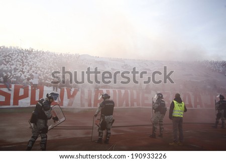 SERBIA, BELGRADE - APRIL 27, 2014: Football fans during eternal rivals have met 146th times in the Eternal soccer derby, FC Partizan and Red Star from Belgrade, was played on 27 April in Belgrade.
