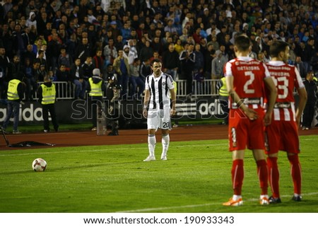 SERBIA, BELGRADE - APRIL 27, 2014: Cakar Damir is preparing a free kick. Eternal rivals have met 146th times in the Eternal soccer derby, FC Partizan and Red Star from Belgrade, was played on 27 April
