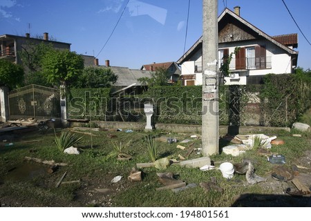 SERBIA, OBRENOVAC - MAY 21: Destroyed yard after floods in Obrenovac under water. The water level of Sava River remains high in worst flooding on record across the Balkans on may 21, 2014