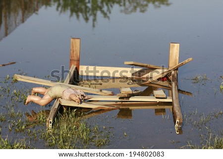 SERBIA, OBRENOVAC - MAY 21: House and street in Obrenovac under water. The water level of Sava River remains high in worst flooding on record across the Balkans on may 21, 2014