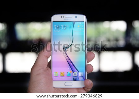 Belgrade, Serbia - May 16, 2015: Mobile phone White Pearl  Samsung Galaxy 6 EDGE With curved glass and metal with 16 mp Camera.