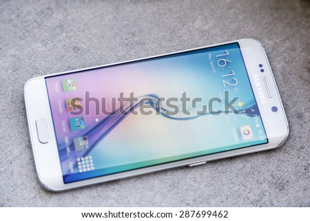 Belgrade Serbia April 23 2015 Shot of a White Pearl Samsung S6 Edge quad-core 2 7 GHz with main 16 mp Camera and 440 x 2560 pixels Display Resolution Belgrade Serbia April 23 2015 Shot of a White Pearl Samsung S6 Edge quad-core 2 7 GHz with main 16 mp Camera and 440 x 2560 pixels Display Resolution