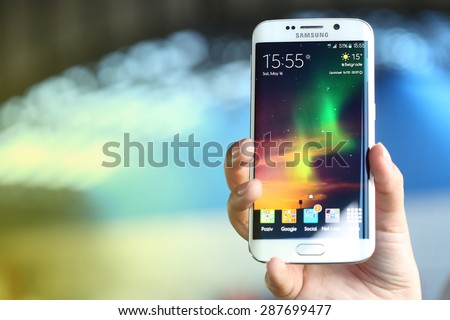 Belgrade, Serbia - May 16, 2015: Mobile phone White Pearl  Samsung Galaxy 6 EDGE With curved glass and metal with 16 mp Camera.