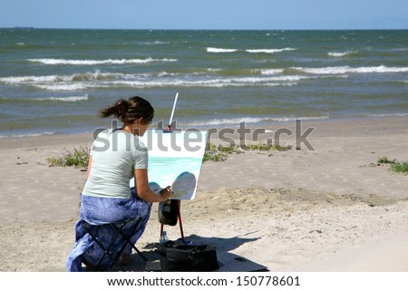 girl painting sea ocean wind