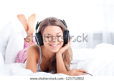 Listening Music On Bed
