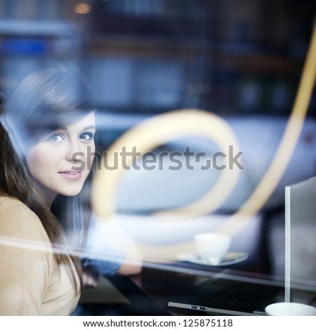 Young woman in coffee shop