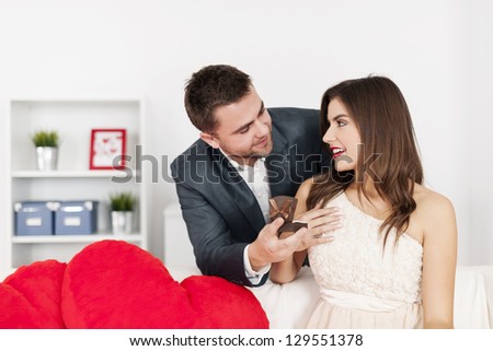 Attractive man proposing to woman