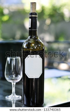 Red wine bottle on table