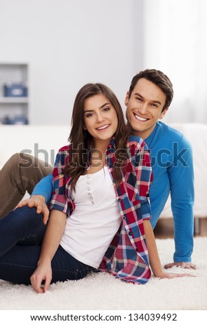 Loving couple in living room