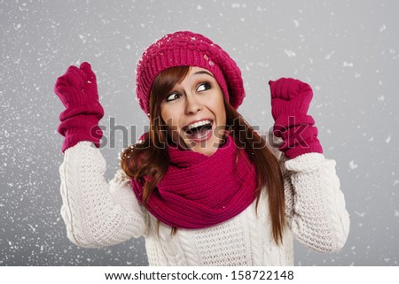 Young woman enjoys first snow