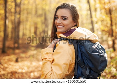Portrait of beautiful and smiling female hiker