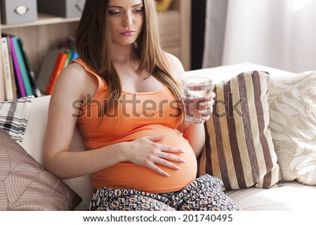 Pregnant young woman with nausea