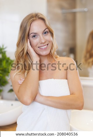 Portrait of blonde woman after shower