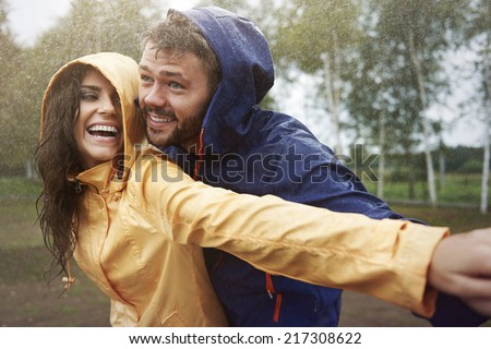 Romantic love in the pouring rain