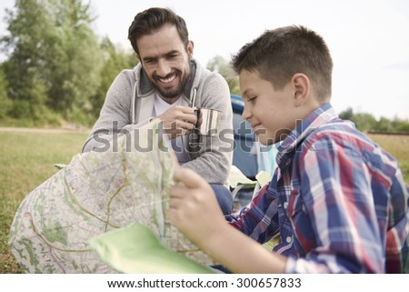 Boy planning a trail for him and his father