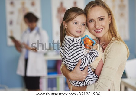 Portrait of mother and daughter at the doctor