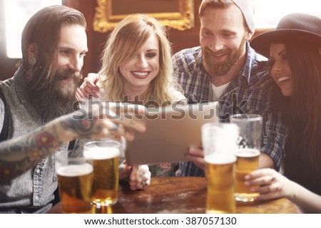 Using digital tablet in the pub