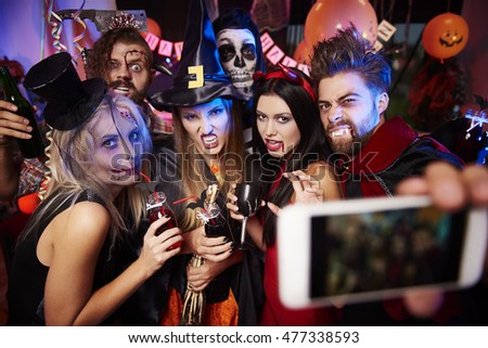 Spooky friends posing on the selfie