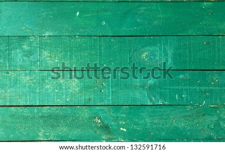 picture off rough saw planks, green painted, useful as texture or background