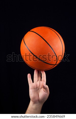 Basketball ball in male hands