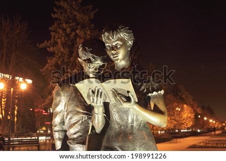 KRASNODAR - Russia, OCTOBER - 30, 2013: Monument of Shurik and Lida, heroes of soviet movie \'Operatsiya Y i drugie priklyucheniya Shurika\'. Author Pchelina.