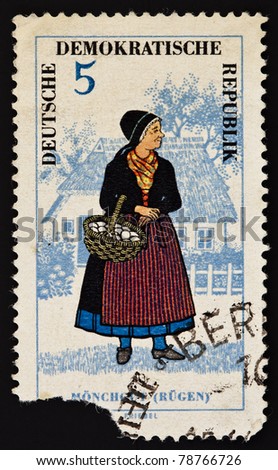 EAST GERMANY (DDR) - CIRCA 1966: A stamp printed in East Germany shows regional costume of Mönchgut(Rügen). East Germany, circa 1966