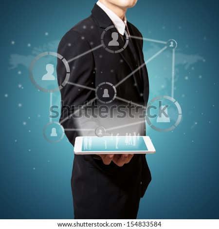 businessman hold connection of social  business on tablet