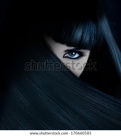 Mysterious Brunette With Hair Covered Face And Aquamarine Eyes