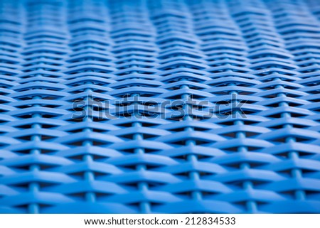 Texture of blue plastic mesh structure closeup/Blue Wickerwork Detail