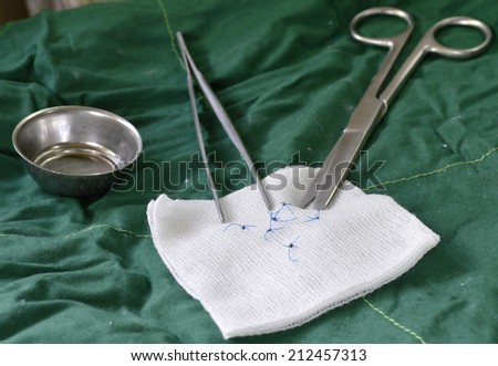 tool medical for remove needle stitches.