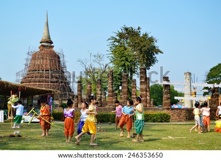 OLD CITY SUKHOTHAI THAILAND - JANUARY 16 : Thai Children folk games show on Ramkhumhang day festival JANUARY 15,2015 in Thailand.