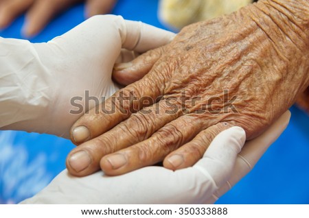 Mental health doctor support the elderly woman.