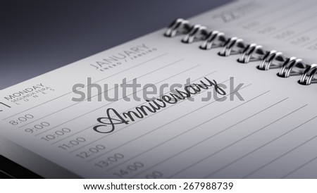 Closeup of a personal agenda marking a day of the month representing a organizing time and schedule. Anniversary text note reminder concept. Words Anniversary written in Black Marker.
