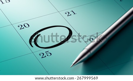 Closeup of a personal agenda, organizer or planner, setting an important date with a Ballpoint pen marking a day of the month representing a organizing time and schedule.