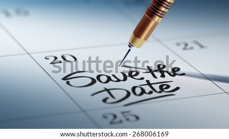 A dart stick on Calendar. Concept image of a Calendar with a dart stick. Closeup shot of a dart attached. Save the date text note reminder concept. Words Save the date written in Black Marker.