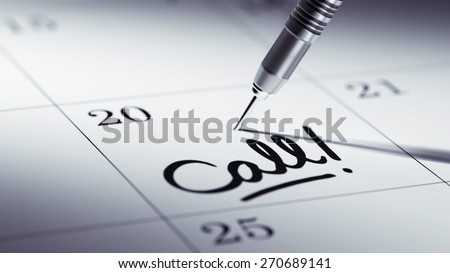 Concept image of a Calendar with a golden dart stick. The words Call written on a white notebook to remind you an important appointment.