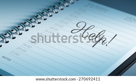 Closeup of a personal calendar setting an important date representing a time schedule. The words Help written on a white notebook to remind you an important appointment.