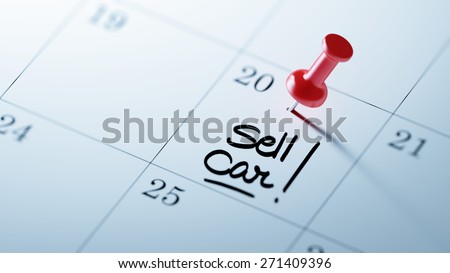 Concept image of a Calendar with a red push pin. Closeup shot of a thumbtack attached. The words Sell Car written on a white notebook to remind you an important appointment.