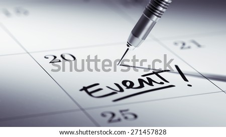 Concept image of a Calendar with a golden dart stick. The words Event written on a white notebook to remind you an important appointment.